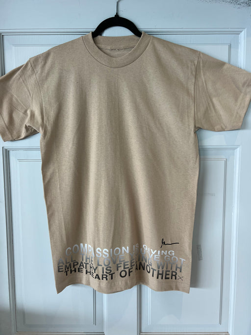 Unisex Compassion Crewneck Short sleeve tee shirt in Sand