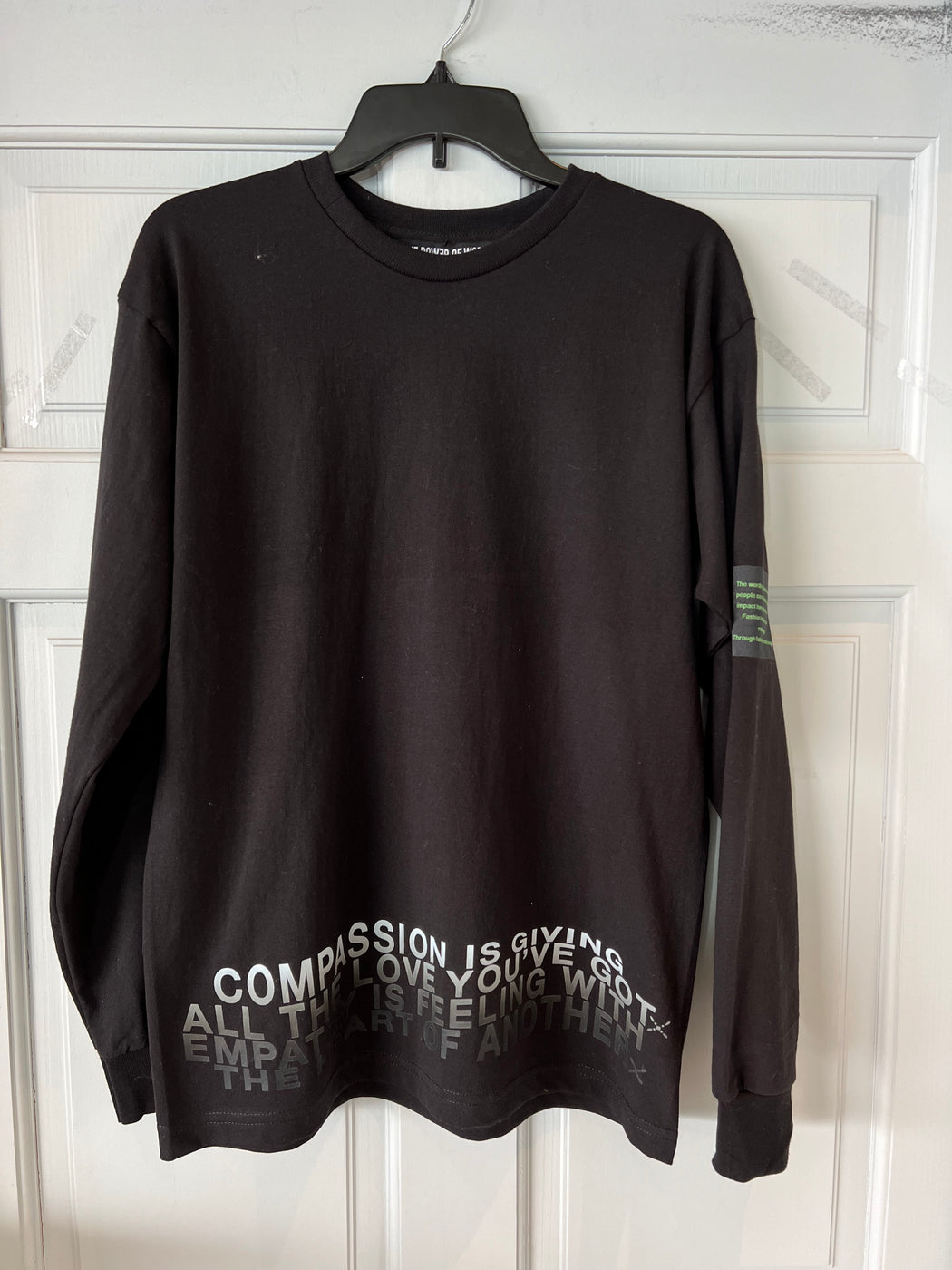 Unisex Compassion Crewneck Long sleeve tee shirt in Black