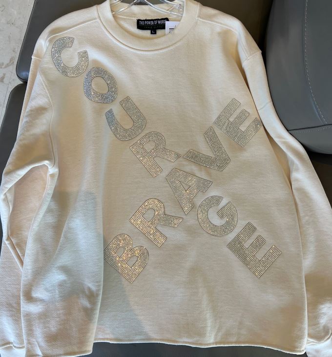 Unisex Courage Crewneck sweatshirt in Cream