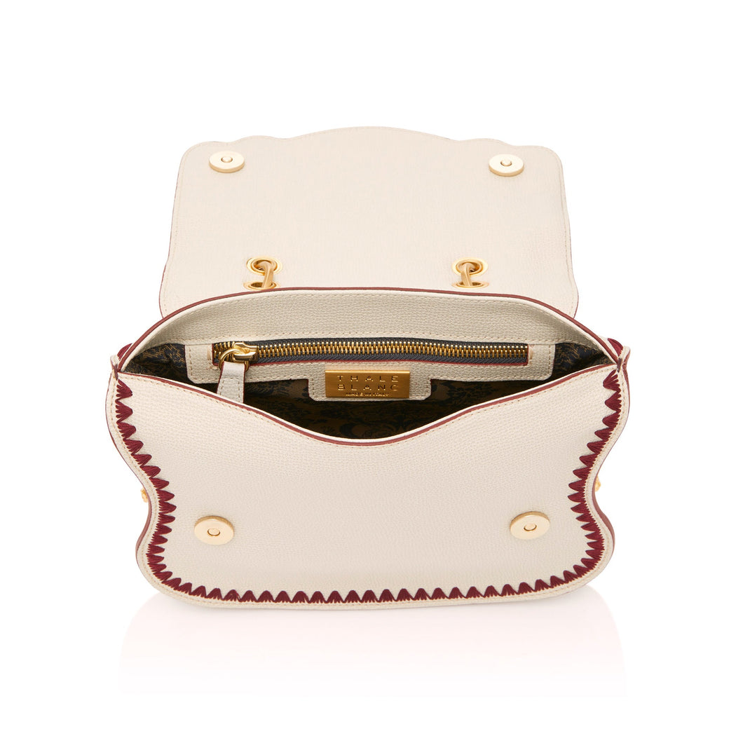 Audrey Crossbody: Designer Crossbody in White with Red trim