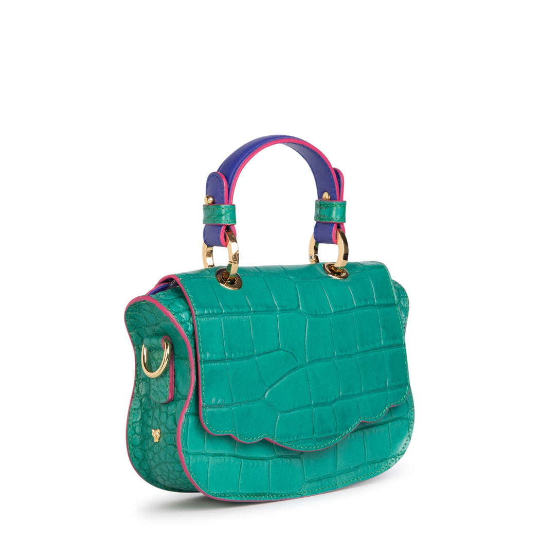 Green croc-embossed handbag that can be worn as a mini crossbody bag